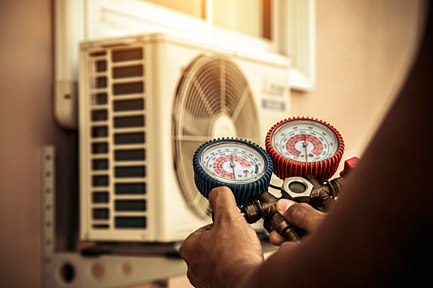Professional Air Conditioning Service technician working in Glenmoore, PA